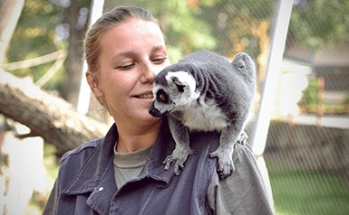 woman and lemur at Great Plains Zoo