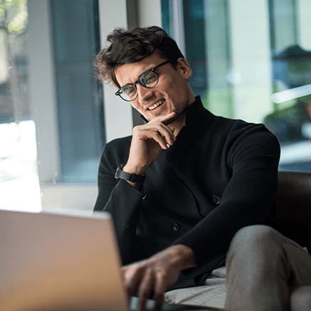 man looking at laptop