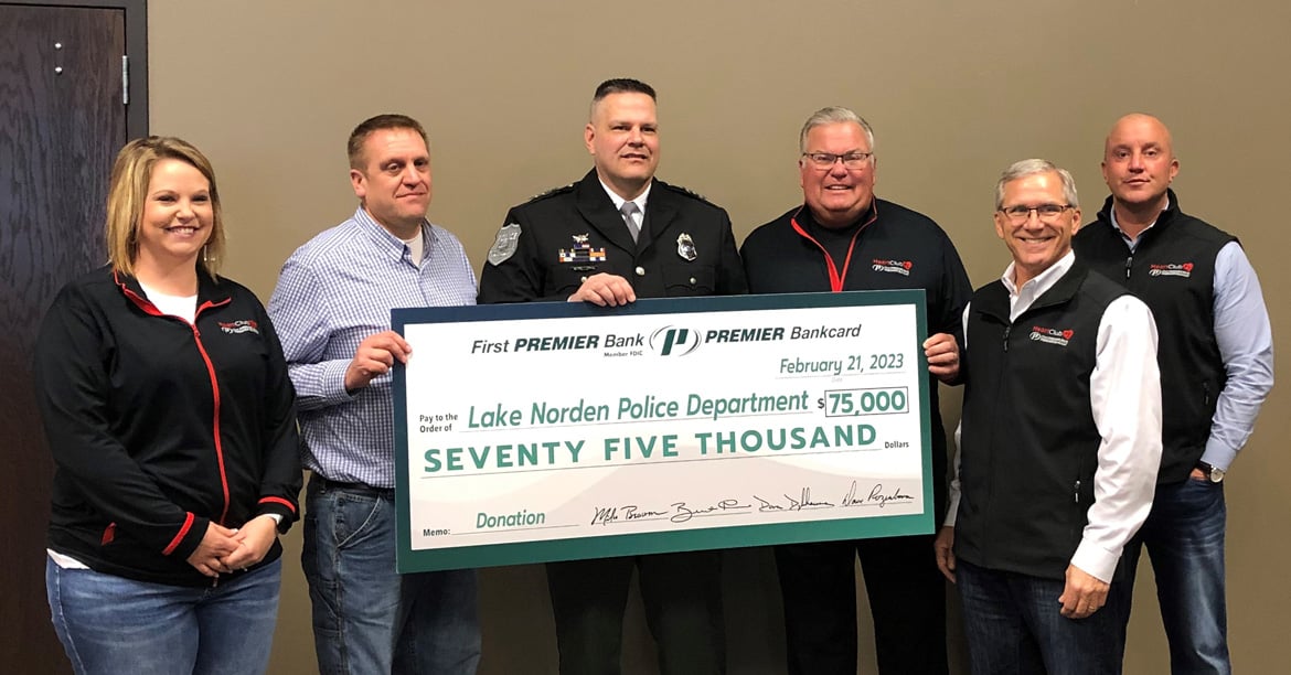 Lake Norden Police receiving donation check from First PREMIER Bank/PREMIER Bankcard staff